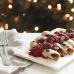 Sprouted oat crepes with raspberries and chocolate sauce