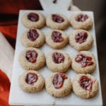 Almond jam cookies on a platter