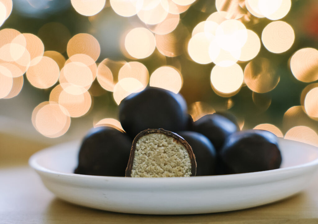Easy Vegan Eggnog Truffles made with DIY sprouted oat flour and dipped in melted chocolate 